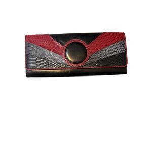 Bebe vintage leather patchwork clutch
